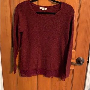 Burgundy sweater with lace trim on the bottom